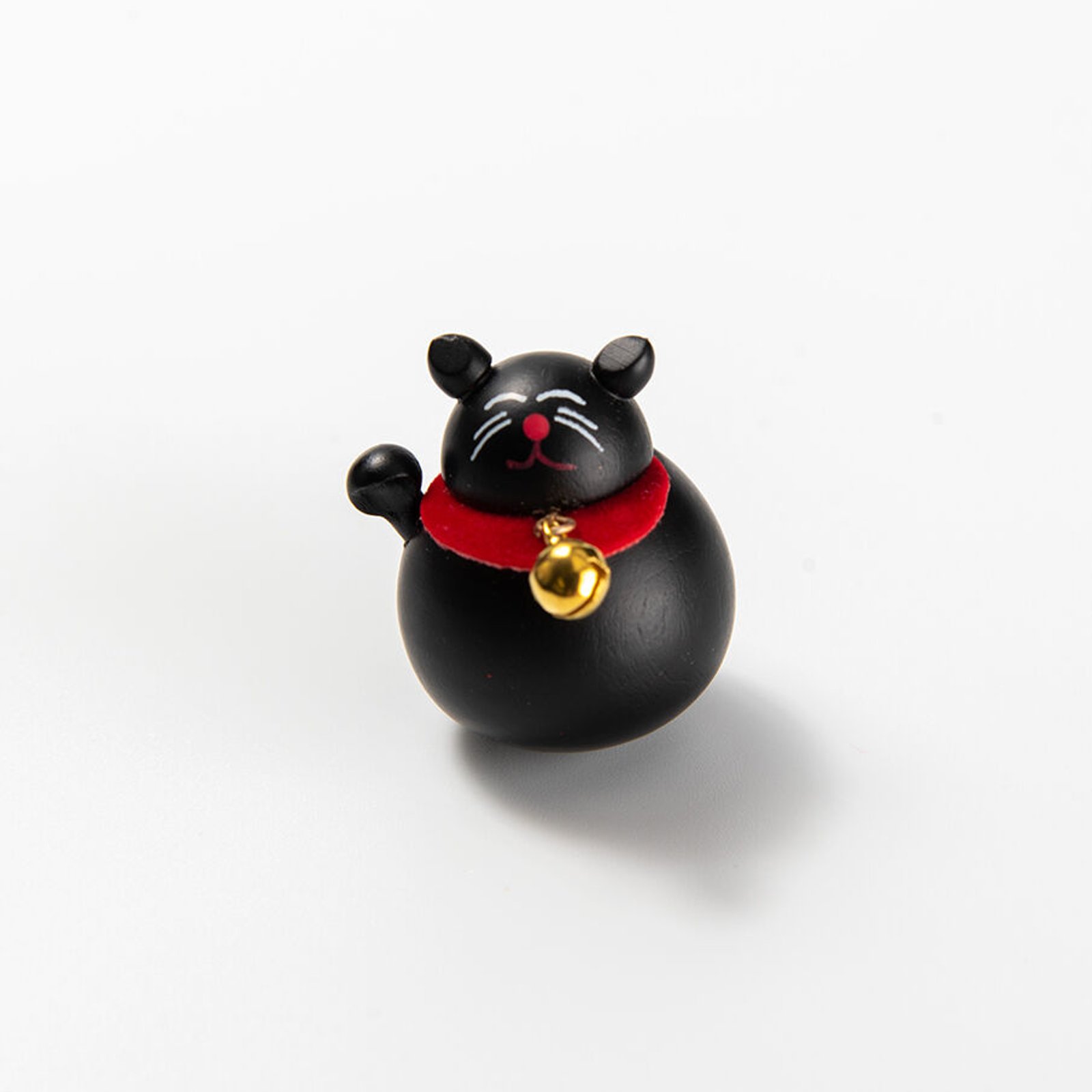 Roly-Poly Black Cat (起き上がり黒猫), an omamori from Zojoji Temple